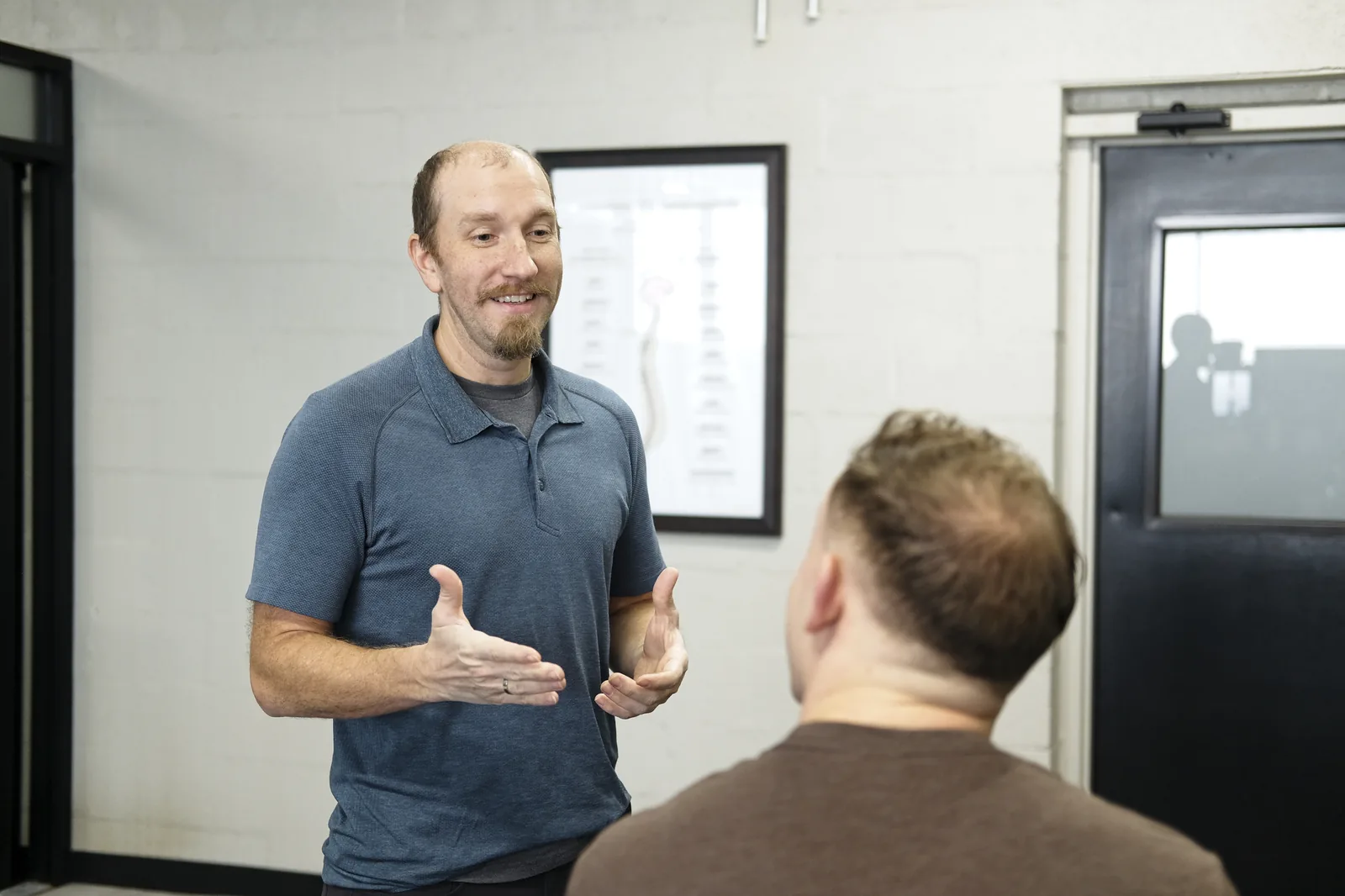 Talking through a nervous-system-focused evaluation in Huntsville, AL at Functional Chiropractic Talking through a nervous-system-focused evaluation in Huntsville, AL at Functional Chiropractic