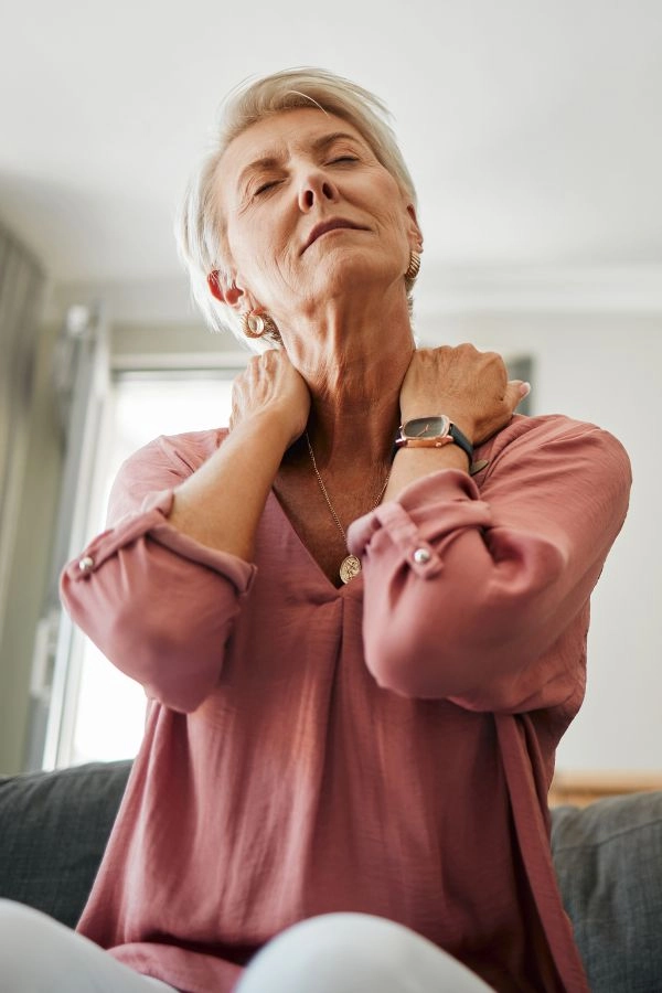 An old women suffering fibromyalgia